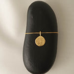 Compass necklace in gold – smelt
