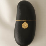 Compass necklace in gold – smelt