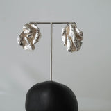 Writer's Block earrings in silver – smelt