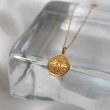 Compass necklace in gold – smelt