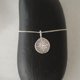 Compass necklace in silver – smelt
