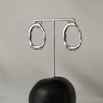 Ensō earrings in silver – smelt