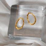 Orbit earrings in gold – smelt